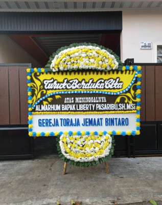Papan Bunga Duka di Pangampelan
